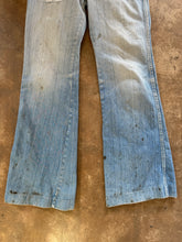 Vintage distressed flare jeans