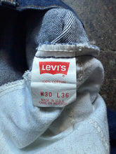Vintage Levi’s 684 dark wash bell bottoms | tag size 30x36