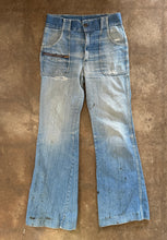 Vintage distressed flare jeans
