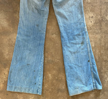 Vintage distressed flare jeans