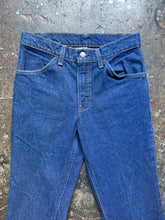 Vintage Levi’s 684 dark wash bell bottoms | tag size 30x36