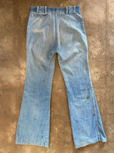 Vintage distressed flare jeans