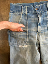 Vintage distressed flare jeans