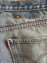 Vintage Distressed Blue Jeans
