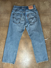 Vintage Levi’s distressed 569 loose straight leg jeans
