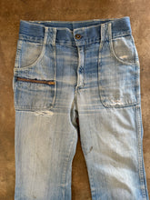 Vintage distressed flare jeans