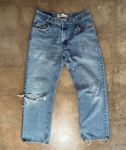 Vintage Levi’s distressed 569 loose straight leg jeans