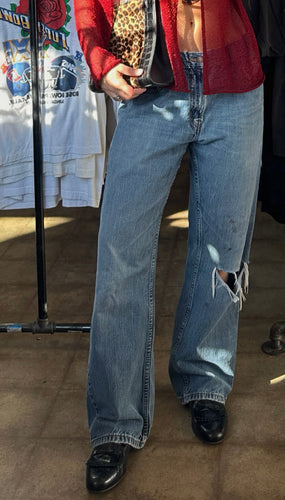 Vintage Levi’s distressed 569 loose straight leg jeans