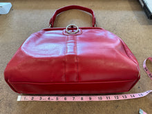 Vintage red leather shoulder bag purse with a top handle and a metal ring detail