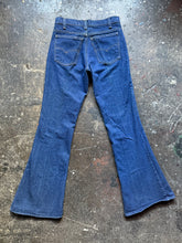 Vintage Levi’s 684 dark wash bell bottoms | tag size 30x36