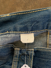 Vintage distressed flare jeans