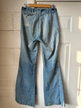 Vintage distressed flare jeans
