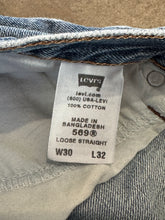 Vintage Levi’s distressed 569 loose straight leg jeans