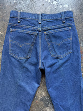 Vintage Levi’s 684 dark wash bell bottoms | tag size 30x36