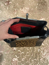 Vintage Brighton leopard print shoulder bag with black leather and braided straps